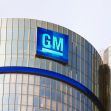 GM logo on the company headquarters building, representing its commitment to electric vehicles and sustainability. GM logo on the company headquarters building, representing its commitment to electric vehicles and sustainability.