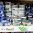 Canned tuna products from various brands displayed on store shelves. Canned tuna products from various brands displayed on store shelves.