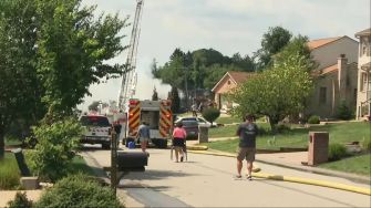 Emergency responders at the scene of a home explosion in Plum, Pennsylvania, where at least three homes were leveled and five people lost their lives.