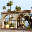 The entrance to Paramount Pictures, surrounded by palm trees. The entrance to Paramount Pictures, surrounded by palm trees.