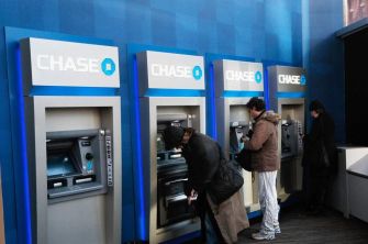 People using Chase bank ATMs.