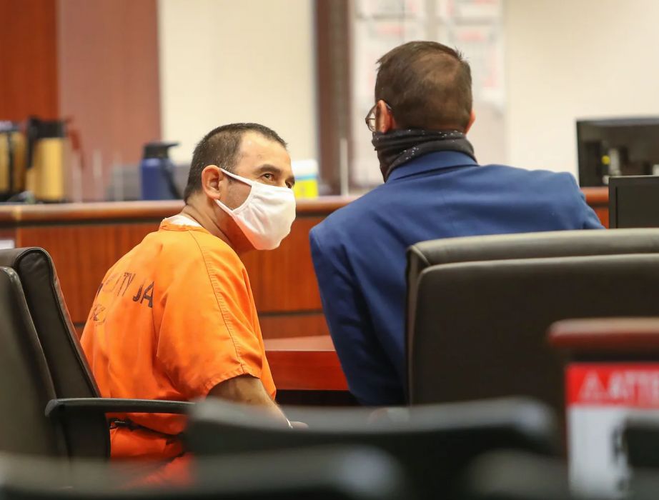 Ricardo Aguirre, left, talks with his attorney Charles Roby during a sentencing hearing at the Larson Justice Center in Indio on Aug. 6, 2020. Aguirre was notified that he tested positive for COVID-19 on the second day of his trial while he was in the courtroom.  (Jay Calderon/The Desert Sun)