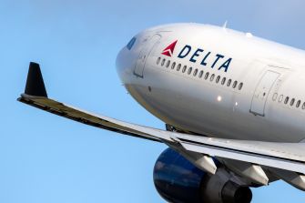 Close-up of a Delta Airlines aircraft in flight.
