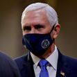 Mike Pence wearing a mask during a formal event. Mike Pence wearing a mask during a formal event.