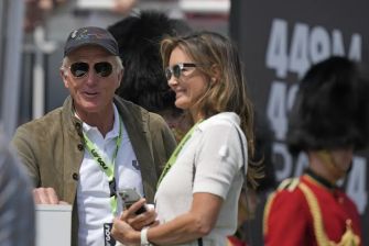 Greg Norman and his wife, Kirsten Kutner, at a public event.