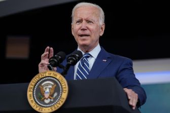 President Biden speaking at an event, addressing issues related to migrant families separated at the border.
