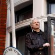 Julian Assange standing at the window of the Ecuadorian Embassy, where he sought asylum for several years. Julian Assange standing at the window of the Ecuadorian Embassy, where he sought asylum for several years.
