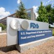 Sign for the U.S. Food and Drug Administration (FDA) outside their headquarters building. Sign for the U.S. Food and Drug Administration (FDA) outside their headquarters building.