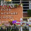 Memorial setup with flowers and crosses for the victims of the Robb Elementary School shooting in Uvalde, Texas. Memorial setup with flowers and crosses for the victims of the Robb Elementary School shooting in Uvalde, Texas.