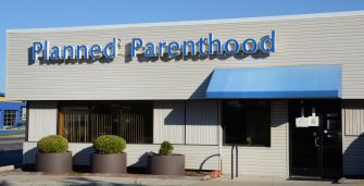 Exterior view of a Planned Parenthood facility with signage.