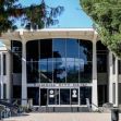 Exterior view of Pomona City Hall with trees in the foreground. Exterior view of Pomona City Hall with trees in the foreground.