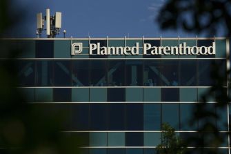 Planned Parenthood building with its logo prominently displayed.