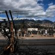 Devastation from the Maui wildfire, showing destruction of buildings and downed power lines in Lahaina. Devastation from the Maui wildfire, showing destruction of buildings and downed power lines in Lahaina.