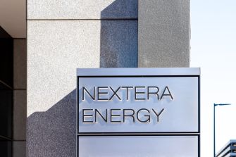 Signage of NextEra Energy displayed on a building facade.
