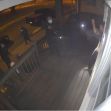 Surveillance footage showing armed bounty hunters and police officers at a home's front porch during a raid. Surveillance footage showing armed bounty hunters and police officers at a home's front porch during a raid.