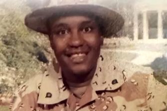 U.S. Army Sgt. Angela Sutton Washington in military uniform during her service in Operation Desert Storm.