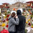 People who knew shooting victim Neven Stanisic comfort each other at a makeshift memorial outside a King Soopers grocery store on March 25, 2021 in Boulder, Colorado. (Michael Ciaglo/Getty Images via NBC News)