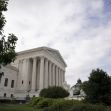 Exterior view of the U.S. Supreme Court building, featuring its iconic columns and a flagpole. Exterior view of the U.S. Supreme Court building, featuring its iconic columns and a flagpole.