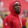 Kansas City Chiefs wide receiver Rashee Rice in a red hoodie during warm-ups at a stadium. Kansas City Chiefs wide receiver Rashee Rice in a red hoodie during warm-ups at a stadium.