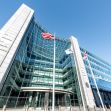 The Securities and Exchange Commission (SEC) building with flags in front, representing the agency's involvement in cryptocurrency regulation. The Securities and Exchange Commission (SEC) building with flags in front, representing the agency's involvement in cryptocurrency regulation.