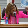 Mayor Tiffany Henyard speaking at a village board meeting, gesturing while addressing concerns over her administration. Mayor Tiffany Henyard speaking at a village board meeting, gesturing while addressing concerns over her administration.