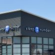 Signage of a Sleep Number store. Signage of a Sleep Number store.
