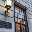 Exterior view of the United States Environmental Protection Agency building with visible lighting and signage. Exterior view of the United States Environmental Protection Agency building with visible lighting and signage.