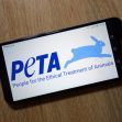 Logo of PETA (People for the Ethical Treatment of Animals) displayed on a smartphone screen. Logo of PETA (People for the Ethical Treatment of Animals) displayed on a smartphone screen.