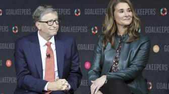 Bill and Melinda Gates at a public event, discussing their philanthropic efforts.