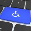 A blue key on a computer keyboard featuring a wheelchair symbol, representing accessibility for individuals with disabilities. A blue key on a computer keyboard featuring a wheelchair symbol, representing accessibility for individuals with disabilities.