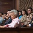 Jury members seated in a courtroom during a trial. Jury members seated in a courtroom during a trial.