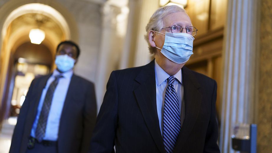 Senate Minority Leader Mitch McConnell, R-Ky., leaves the chamber after criticizing Democrats for wanting to change the filibuster rule, at the Capitol in Washington, Tuesday, March 16, 2021. (AP Photo/J. Scott Applewhite)