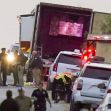 Emergency responders and law enforcement officials investigate a semi-truck after discovering deceased migrants inside near San Antonio, Texas. Emergency responders and law enforcement officials investigate a semi-truck after discovering deceased migrants inside near San Antonio, Texas.