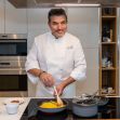 Celebrity chef Todd English cooking in a modern kitchen setting. Celebrity chef Todd English cooking in a modern kitchen setting.