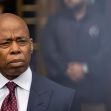 New York City Mayor Eric Adams addressing the media, with a serious expression, amidst ongoing legal challenges. New York City Mayor Eric Adams addressing the media, with a serious expression, amidst ongoing legal challenges.