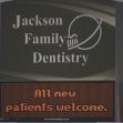 Sign for Jackson Family Dentistry welcoming new patients. Sign for Jackson Family Dentistry welcoming new patients.