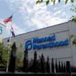 Exterior of a Planned Parenthood facility with an American flag flying nearby. Exterior of a Planned Parenthood facility with an American flag flying nearby.