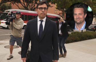 A physician walking outside a courthouse, accompanied by media personnel, with an inset image of an actor.