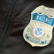 Image of a U.S. Immigration and Customs Enforcement (ICE) officer's badge. Image of a U.S. Immigration and Customs Enforcement (ICE) officer's badge.