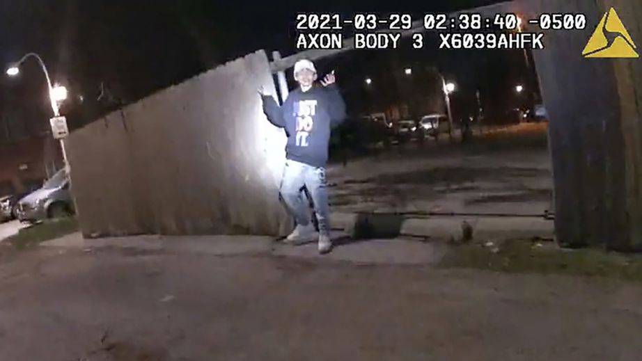 This image from Chicago Police Department body cam video shows the moment before Chicago Police officer Eric Stillman fatally shot Adam Toledo, 13, on March 29, 2021, in Chicago. (Chicago Police Department via AP)