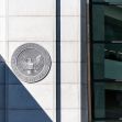 The emblem of the U.S. Securities and Exchange Commission (SEC) on a building exterior. The emblem of the U.S. Securities and Exchange Commission (SEC) on a building exterior.