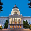 California State Capitol building illuminated at dusk. California State Capitol building illuminated at dusk.