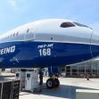 Boeing 787-10 aircraft displayed at an event, showcasing its design and branding. Boeing 787-10 aircraft displayed at an event, showcasing its design and branding.