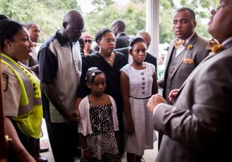Families and representatives of the Emanuel Nine gather during a remembrance event following the church shooting.