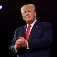 Former President Donald Trump at a public event, appearing contemplative and engaged. Former President Donald Trump at a public event, appearing contemplative and engaged.