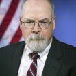 Portrait of John Durham, the special counsel appointed to investigate the origins of the Trump-Russia probe, with an American flag in the background. Portrait of John Durham, the special counsel appointed to investigate the origins of the Trump-Russia probe, with an American flag in the background.