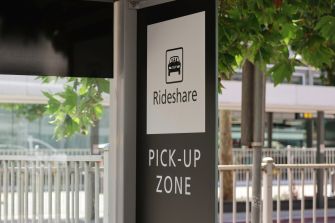 Sign indicating a rideshare pick-up zone.
