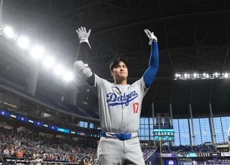 Shohei Ohtani of the Los Angeles Dodgers saluting the crowd during a game at LoanDepot Park in Miami.
