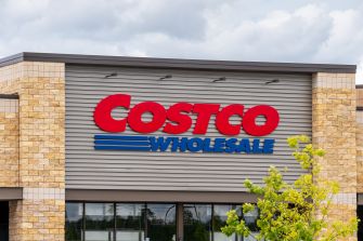 Exterior of a Costco Wholesale store displaying its signage.