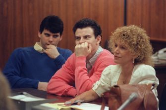 A courtroom scene during the Menendez brothers' trial, featuring the brothers and their attorney.